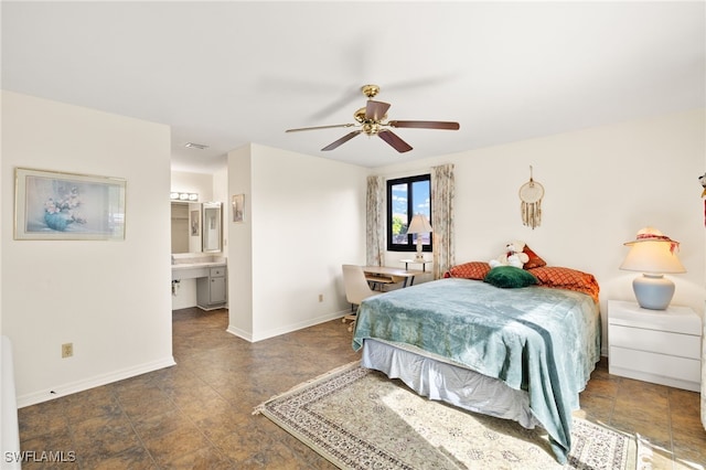 27771 Hacienda E Blvd Unit 223A, Bonita Springs, FL 34135 - bedroom with baseboards, connected bathroom, and ceiling fan