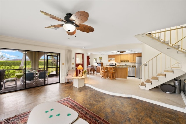 27771 Hacienda E Blvd Unit 223A, Bonita Springs, FL 34135 - living area with a ceiling fan and stairway