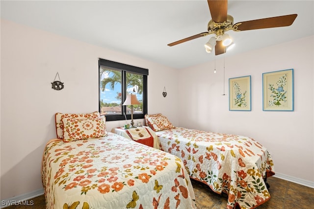 27771 Hacienda E Blvd Unit 223A, Bonita Springs, FL 34135 - bedroom with baseboards and a ceiling fan