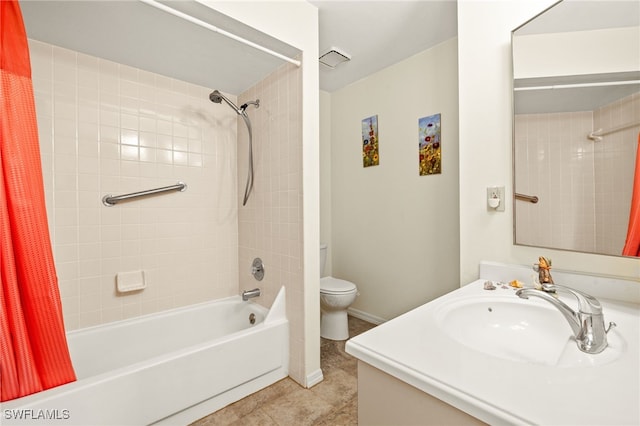 27771 Hacienda E Blvd Unit 223A, Bonita Springs, FL 34135 - bathroom featuring shower / tub combo with curtain, toilet, tile patterned floors, vanity, and baseboards