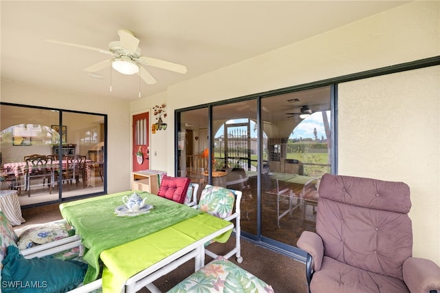 27771 Hacienda E Blvd Unit 223A, Bonita Springs, FL 34135 - sunroom featuring a ceiling fan and outdoor dining space