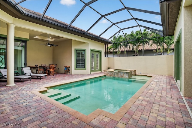 6528 Costa Cir, Naples, FL 34113 - view of pool with a patio, ceiling fan, a pool with connected hot tub, glass enclosure, and outdoor dining space