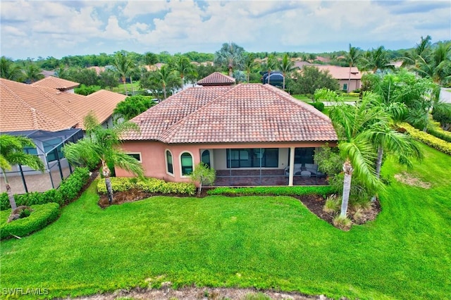 6528 Costa Cir, Naples, FL 34113 - mediterranean / spanish-style house with a tiled roof, a front yard, and stucco siding