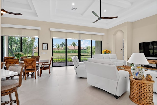 6528 Costa Cir, Naples, FL 34113 - living area with ceiling fan, coffered ceiling, arched walkways, recessed lighting, and beamed ceiling