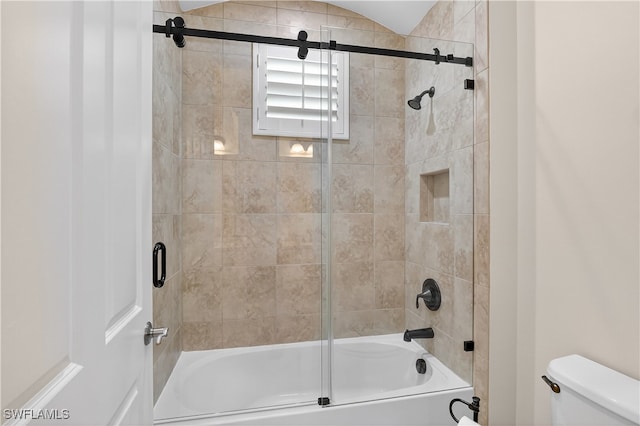 6528 Costa Cir, Naples, FL 34113 - bathroom with toilet and bath / shower combo with glass door