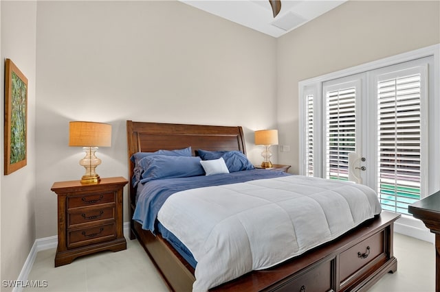 6528 Costa Cir, Naples, FL 34113 - bedroom featuring access to outside and baseboards