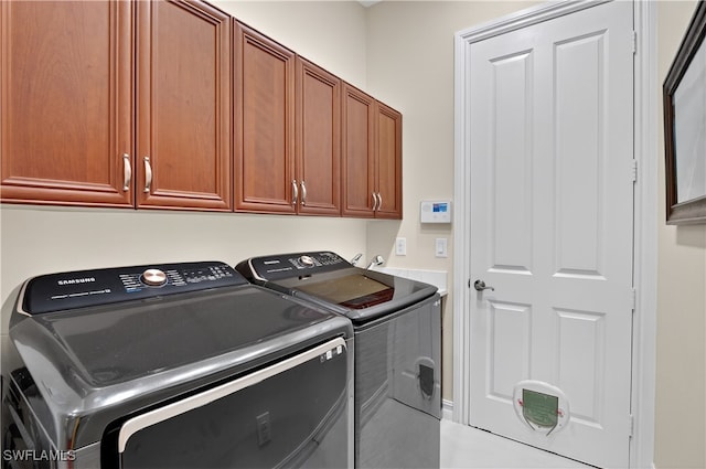 6528 Costa Cir, Naples, FL 34113 - washroom featuring washer and dryer and cabinet space