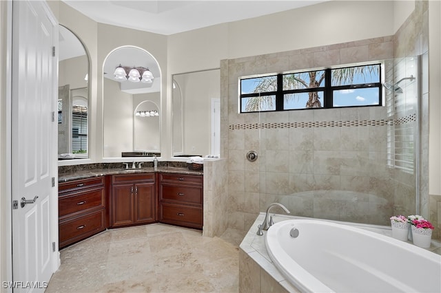6528 Costa Cir, Naples, FL 34113 - full bath featuring a garden tub, vanity, and walk in shower
