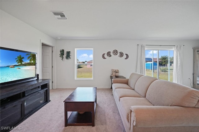3002 NW 3rd Pl, Cape Coral, FL 33993 - living area featuring carpet floors and baseboards