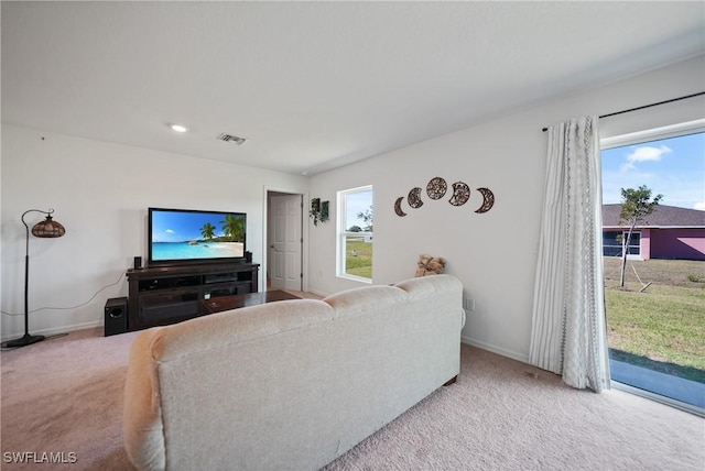 3002 NW 3rd Pl, Cape Coral, FL 33993 - carpeted living room with baseboards and recessed lighting