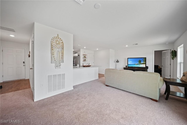 3002 NW 3rd Pl, Cape Coral, FL 33993 - living room featuring carpet flooring and recessed lighting