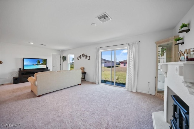 3002 NW 3rd Pl, Cape Coral, FL 33993 - carpeted living room with baseboards, a fireplace, and recessed lighting