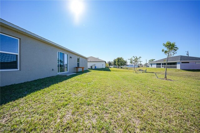 3002 NW 3rd Pl, Cape Coral, FL 33993 - view of grassy yard