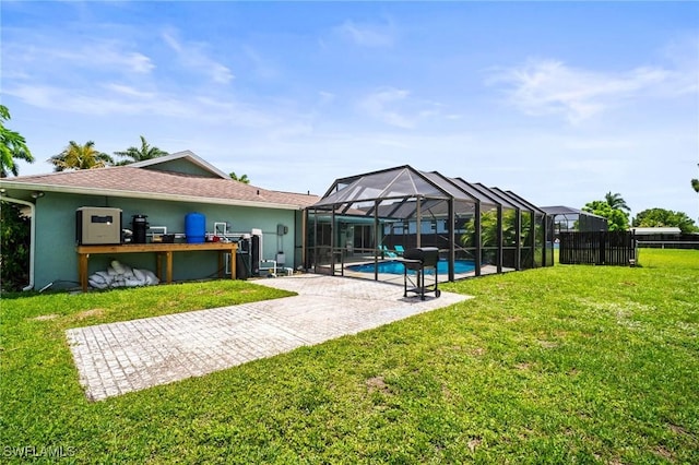 2001 Bahama Ave, Fort Myers, FL 33905 - rear view of property with an outdoor pool, a lanai, stucco siding, and a patio