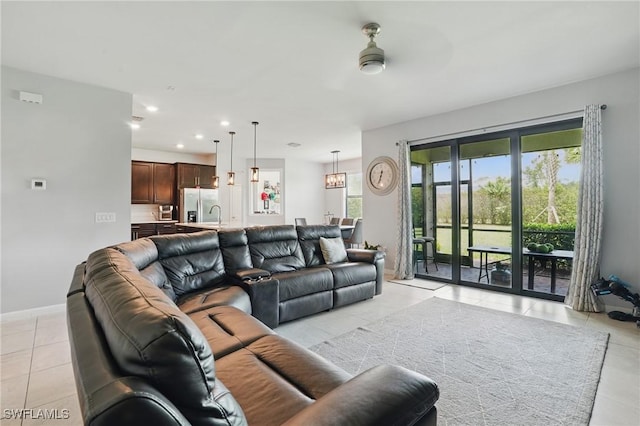 4934 Seton Way, Ave Maria, FL 34142 - living room with light tile patterned flooring, recessed lighting, baseboards, and ceiling fan
