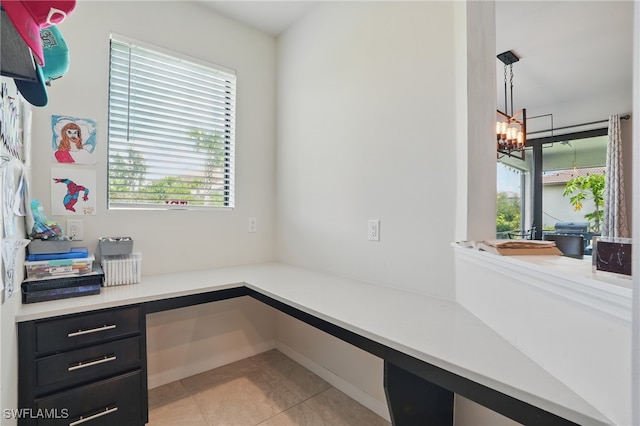 4934 Seton Way, Ave Maria, FL 34142 - unfurnished office with light tile patterned floors and a chandelier