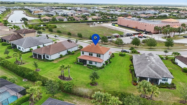 4934 Seton Way, Ave Maria, FL 34142 - aerial perspective of suburban area with a large body of water