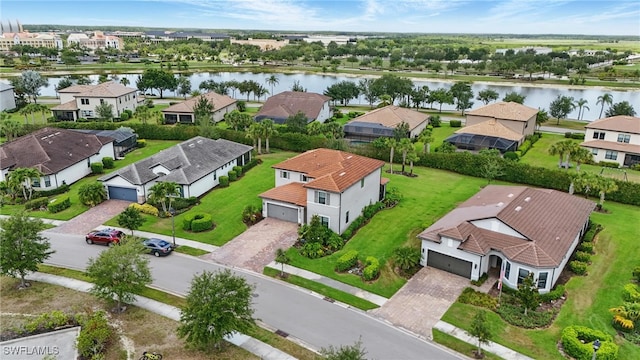 4934 Seton Way, Ave Maria, FL 34142 - aerial perspective of suburban area with a nearby body of water