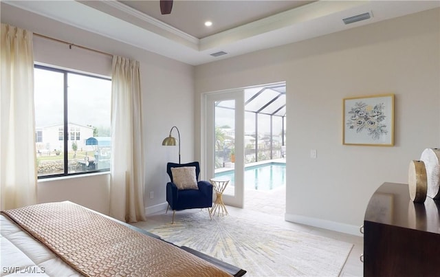 4426 Vasco St, Punta Gorda, FL 33950 - bedroom with multiple windows, a raised ceiling, baseboards, ornamental molding, and recessed lighting