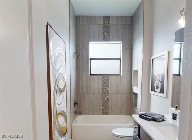 4426 Vasco St, Punta Gorda, FL 33950 - bathroom featuring vanity, toilet, and bathing tub / shower combination