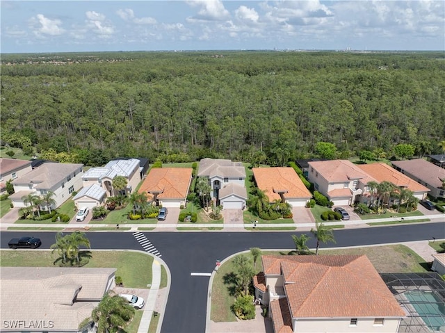 11164 Sparkleberry Dr, Fort Myers, FL 33913 - aerial view of residential area with a heavily wooded area