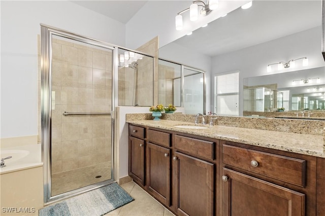 11164 Sparkleberry Dr, Fort Myers, FL 33913 - full bathroom featuring a stall shower, vanity, a bath, and tile patterned flooring