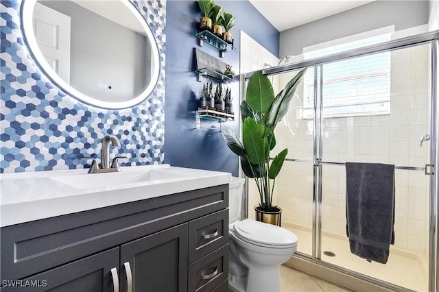11164 Sparkleberry Dr, Fort Myers, FL 33913 - full bath with toilet, a shower stall, vanity, and tile patterned flooring