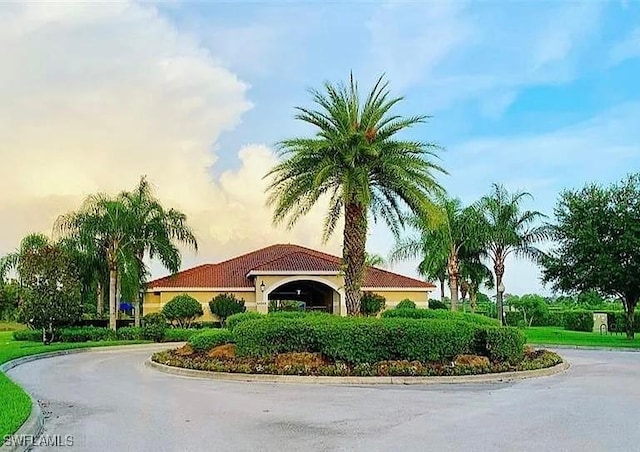 10329 Canal Brook Ln, Lehigh Acres, FL 33936 - community sign featuring curved driveway