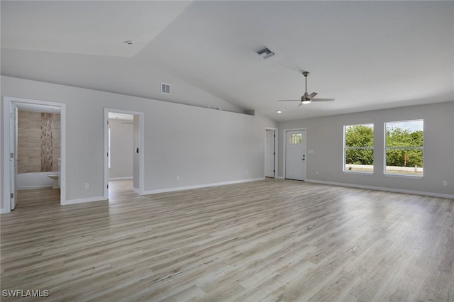 314 Pennfield St, Lehigh Acres, FL 33974 - unfurnished living room featuring a ceiling fan, lofted ceiling, light wood-style flooring, and baseboards