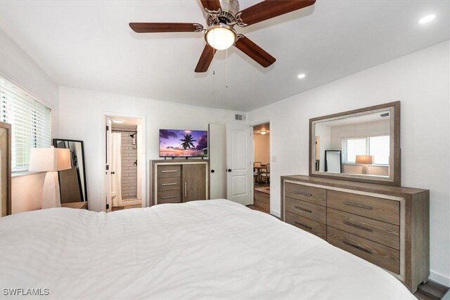 499 Forest Lakes Blvd Unit 306, Naples, FL 34105 - bedroom featuring ensuite bath, recessed lighting, ceiling fan, and baseboards