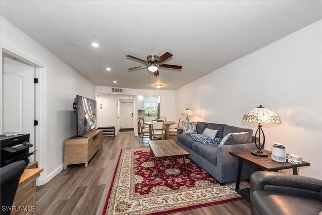 499 Forest Lakes Blvd Unit 306, Naples, FL 34105 - living area featuring a ceiling fan, wood finished floors, recessed lighting, and baseboards