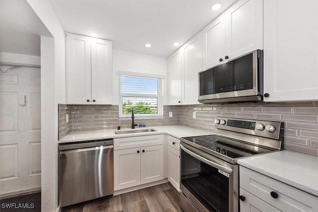 499 Forest Lakes Blvd Unit 306, Naples, FL 34105 - kitchen with appliances with stainless steel finishes, a sink, light countertops, and recessed lighting