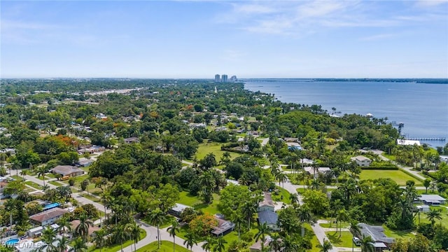 322 New York Dr, Fort Myers, FL 33905 - aerial overview of property's location with a large body of water and nearby suburban area