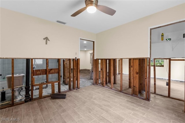322 New York Dr, Fort Myers, FL 33905 - spare room featuring a ceiling fan and light wood-style floors