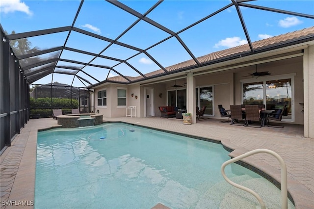 10521 Azzurra Dr, Fort Myers, FL 33913 - view of swimming pool featuring ceiling fan, a patio area, a pool with connected hot tub, and glass enclosure