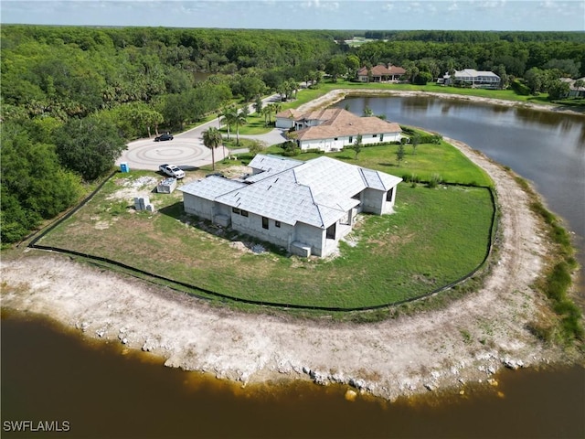 11220 Five Oaks Ln, Naples, FL 34120 - aerial view of a forest and a nearby body of water