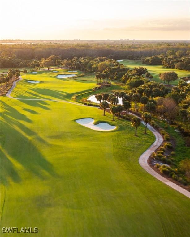 11220 Five Oaks Ln, Naples, FL 34120 - view of community featuring a water view and golf course view