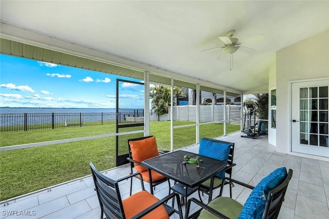 2250 SE 28th St, Cape Coral, FL 33904 - sunroom / solarium featuring ceiling fan, outdoor dining area, a water view, and vaulted ceiling