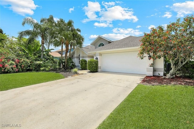 2250 SE 28th St, Cape Coral, FL 33904 - view of front of house with a garage, concrete driveway, a front yard, stucco siding, and a shingled roof