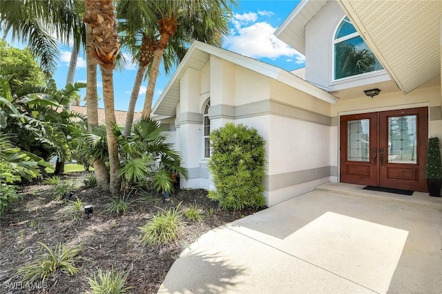 2250 SE 28th St, Cape Coral, FL 33904 - doorway to property featuring french doors
