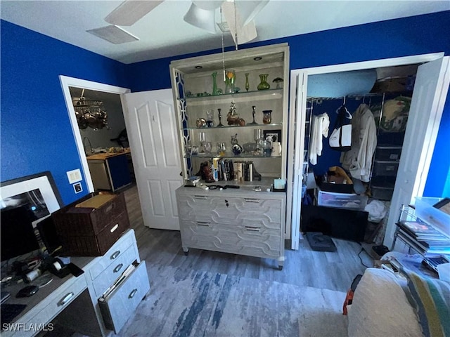 4767/4765 22nd St SW, Lehigh Acres, FL 33973 - bedroom featuring wood finished floors, a closet, and a ceiling fan