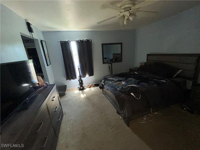 4767/4765 22nd St SW, Lehigh Acres, FL 33973 - carpeted bedroom featuring a ceiling fan