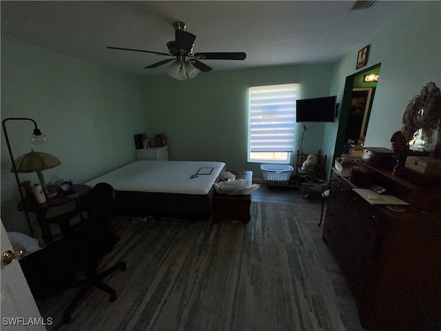 4767/4765 22nd St SW, Lehigh Acres, FL 33973 - bedroom featuring dark wood-type flooring and ceiling fan