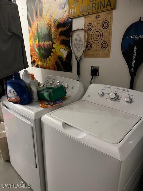 4767/4765 22nd St SW, Lehigh Acres, FL 33973 - washroom featuring washer and clothes dryer