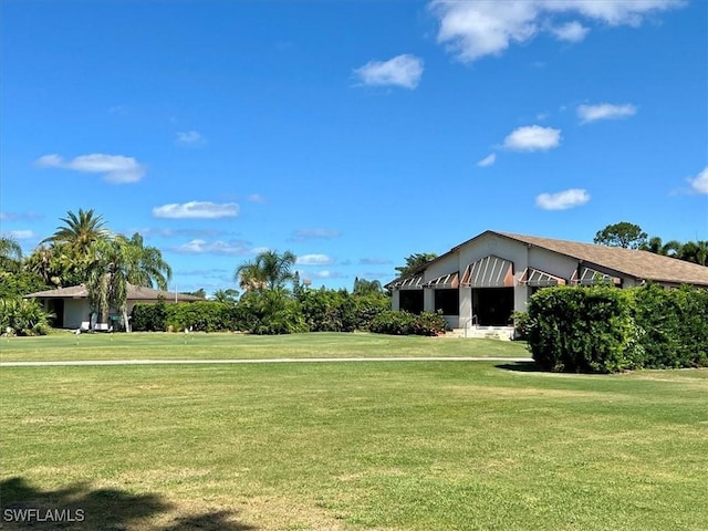 3127 Boca Ciega Dr Unit B6, Naples, FL 34112 - view of community with a lawn