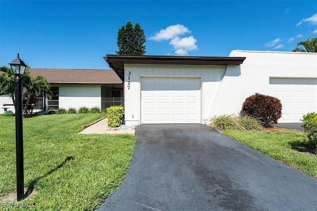 3127 Boca Ciega Dr Unit B6, Naples, FL 34112 - single story home featuring an attached garage, driveway, and a front lawn