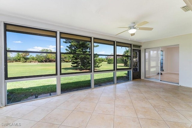 3127 Boca Ciega Dr Unit B6, Naples, FL 34112 - unfurnished sunroom featuring a ceiling fan