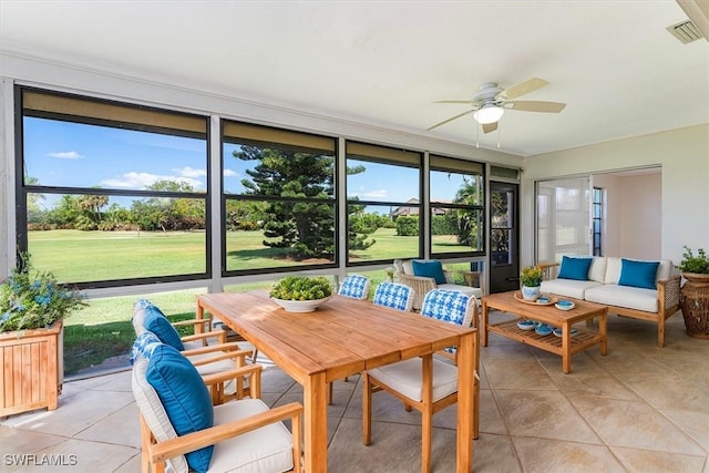 3127 Boca Ciega Dr Unit B6, Naples, FL 34112 - sunroom with ceiling fan and an outdoor living space