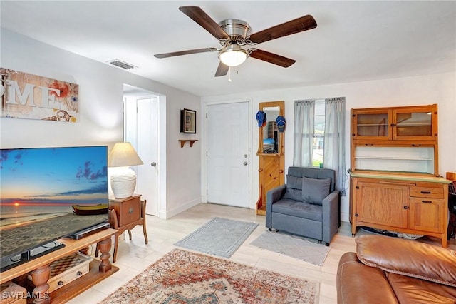 2153 Twin Brooks Rd, North Fort Myers, FL 33917 - living room with a ceiling fan