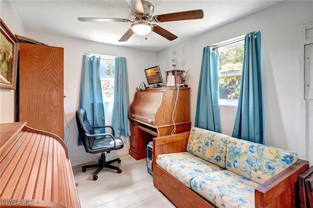 2153 Twin Brooks Rd, North Fort Myers, FL 33917 - office area with plenty of natural light and a ceiling fan